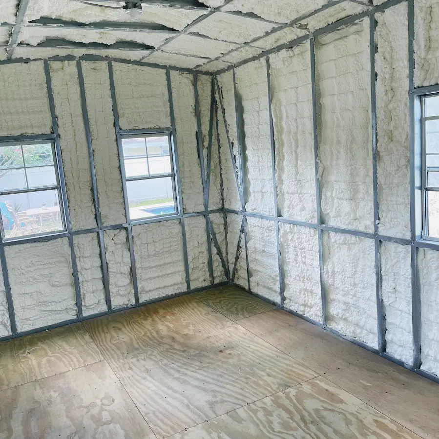 Closed-cell spray foam insulation applied to wall cavities in a residential project in Scarborough